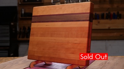 Striped edge grain cutting board